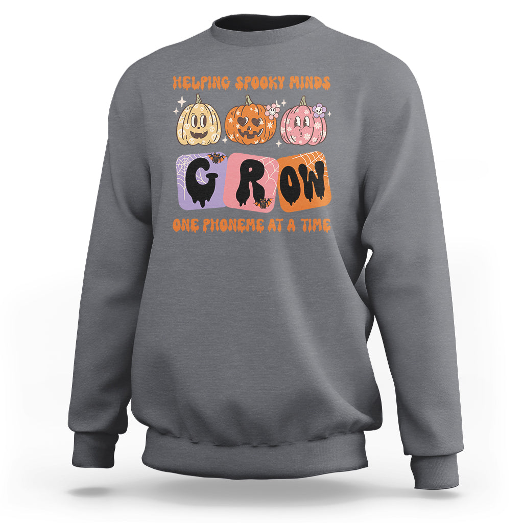halloween-reading-sweatshirt-helping-spooky-minds-grow-one-phoneme-dyslexia-pumpkin