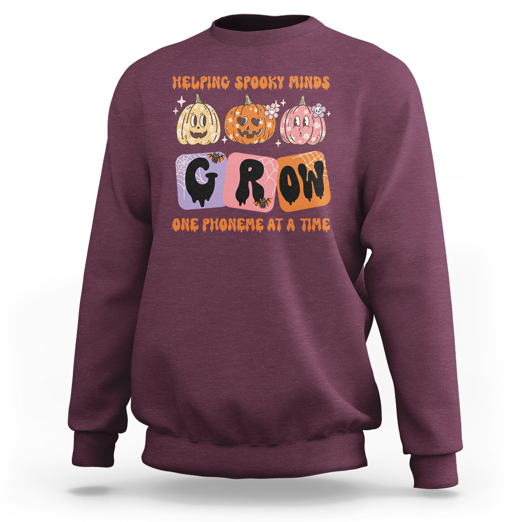 halloween-reading-sweatshirt-helping-spooky-minds-grow-one-phoneme-dyslexia-pumpkin