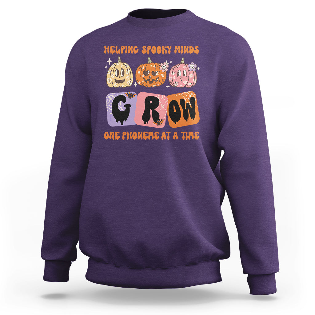 halloween-reading-sweatshirt-helping-spooky-minds-grow-one-phoneme-dyslexia-pumpkin