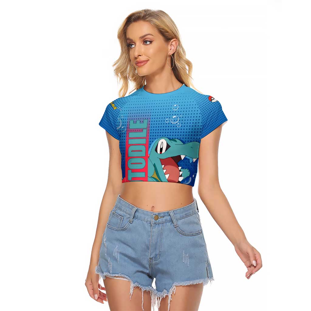 Totodile from Poké Raglan Cropped T Shirt with Water Type Power and Playful Pose Design - The Mazicc