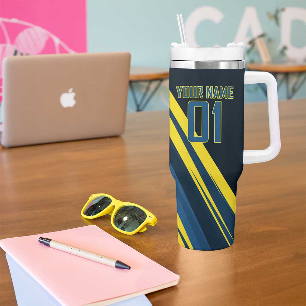 Personalized Genos Volleyball Design Tumbler With Handle with Yellow and Blue Athletic Theme and Dynamic Spike Pose