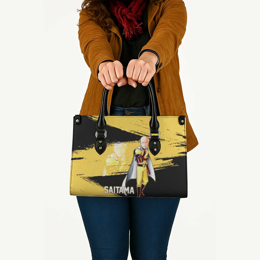 Saitama One Punch Man Anime Yellow and Black Theme Leather Bag with Heroic Pose and Dynamic Brushstroke Background - The Mazicc