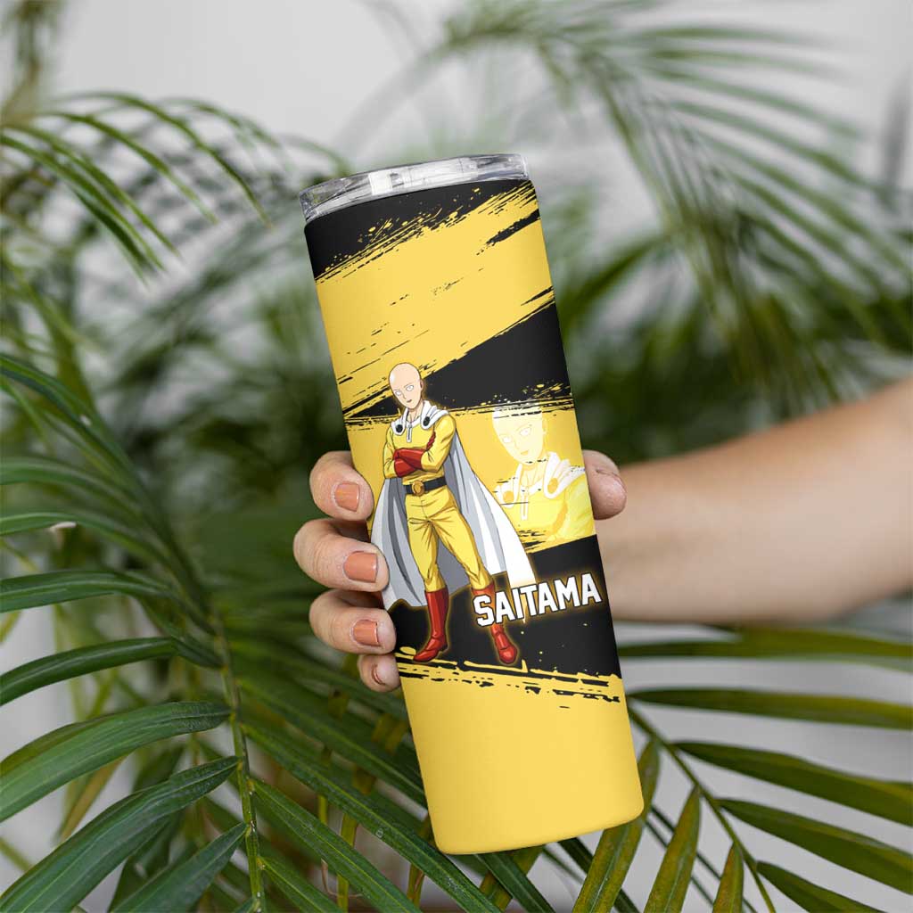 Saitama One Punch Man Anime Yellow and Black Theme Skinny Tumbler with Heroic Pose and Dynamic Brushstroke Background - The Mazicc