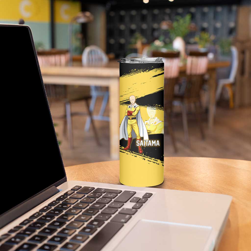 Saitama One Punch Man Anime Yellow and Black Theme Skinny Tumbler with Heroic Pose and Dynamic Brushstroke Background - The Mazicc