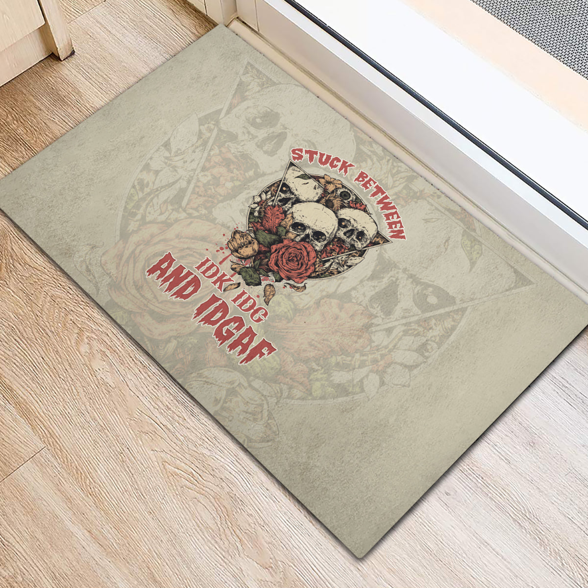 stuck-between-idk-idc-and-idgaf-skull-rubber-doormat