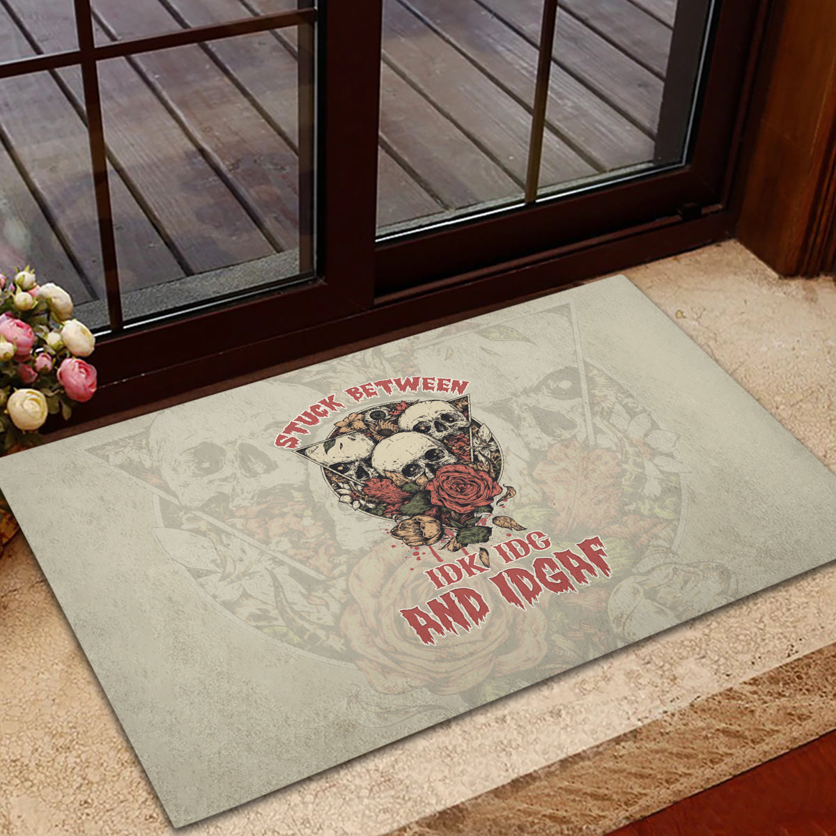 stuck-between-idk-idc-and-idgaf-skull-rubber-doormat