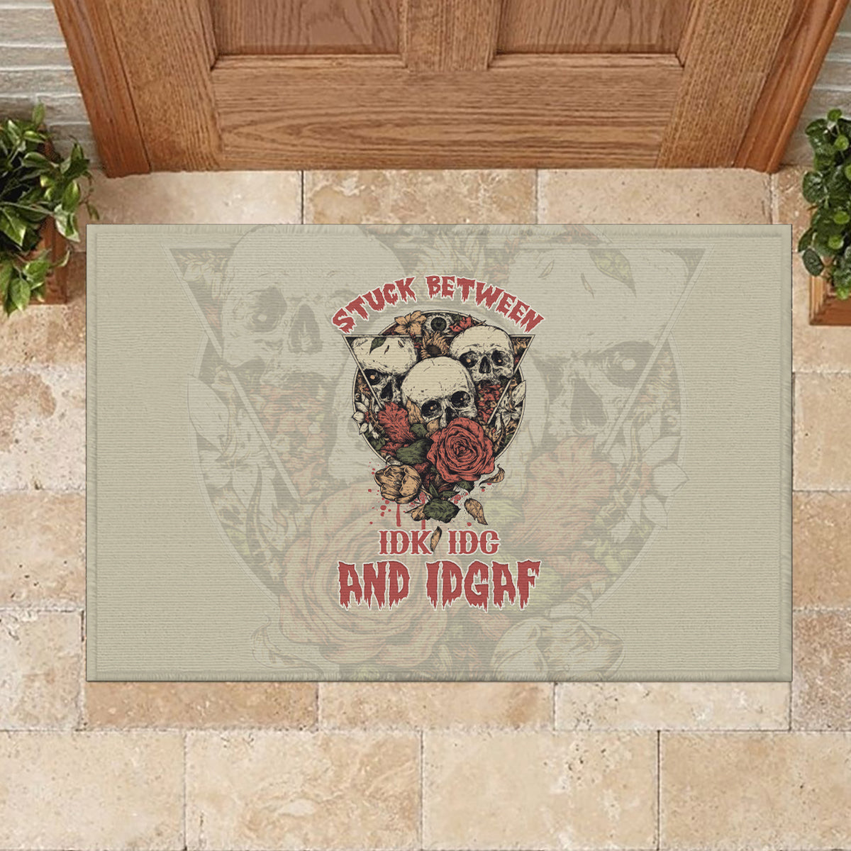 stuck-between-idk-idc-and-idgaf-skull-rubber-doormat