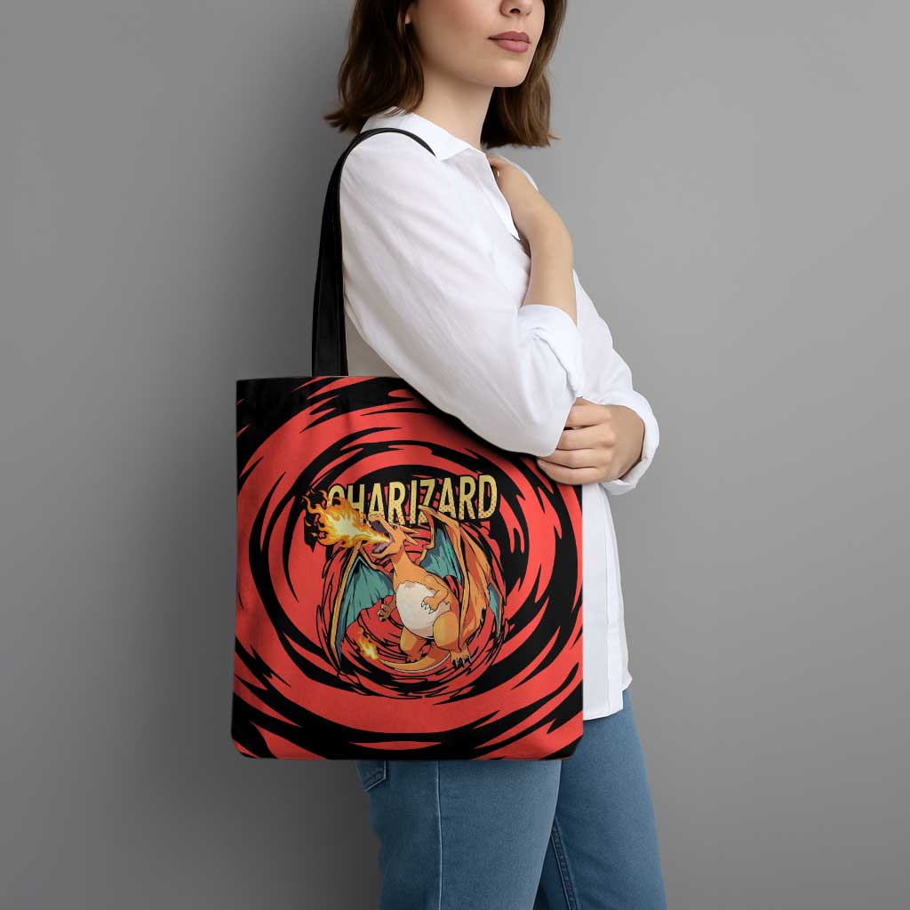 Charizard Pokémon Red and Black Swirl Design Tote Bag with Flames, Pokéball Accents, and Dynamic Fire-Breathing Pose - The Mazicc