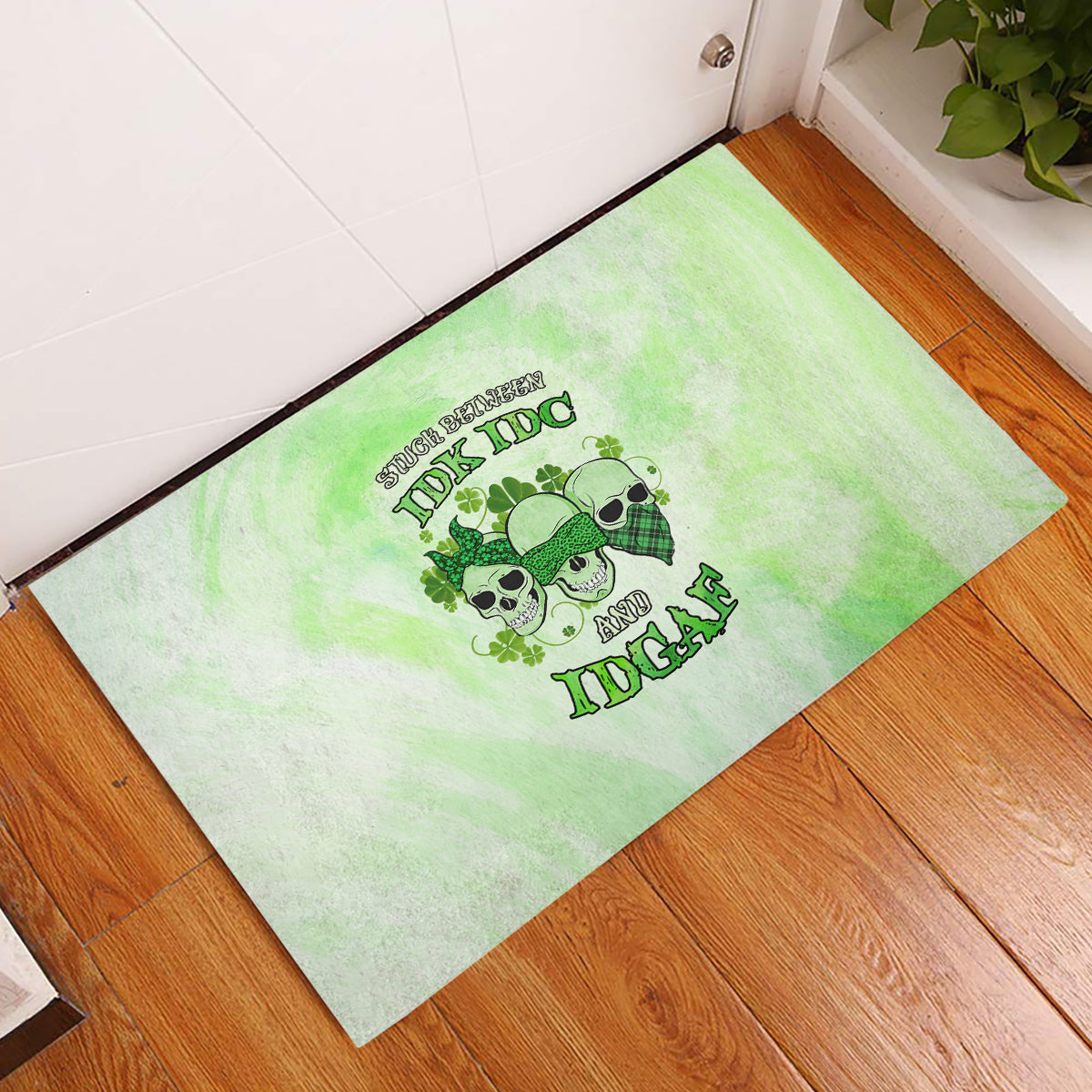 stuck-between-idk-idc-and-idgaf-rose-skull-patricks-day-rubber-doormat
