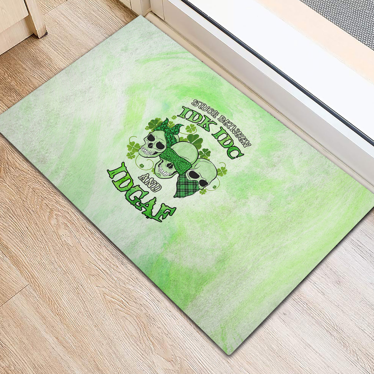 stuck-between-idk-idc-and-idgaf-rose-skull-patricks-day-rubber-doormat