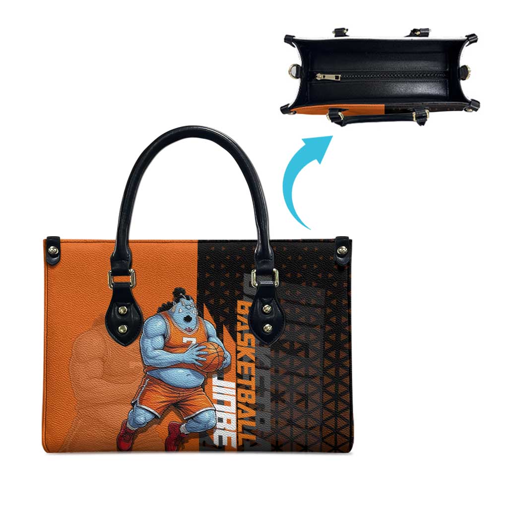Jinbe One Piece Basketball Theme Orange and Black Design Leather Bag with Powerful Pose and Sun Pirates Emblem - The Mazicc