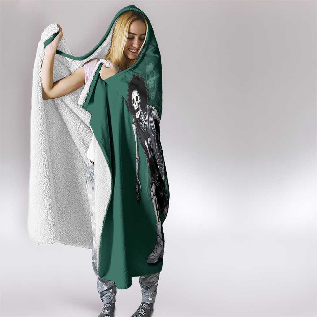 Brook One Piece Basketball Theme Green and Black Design Hooded Blanket with Skull Emblem and Energetic Pose - The Mazicc