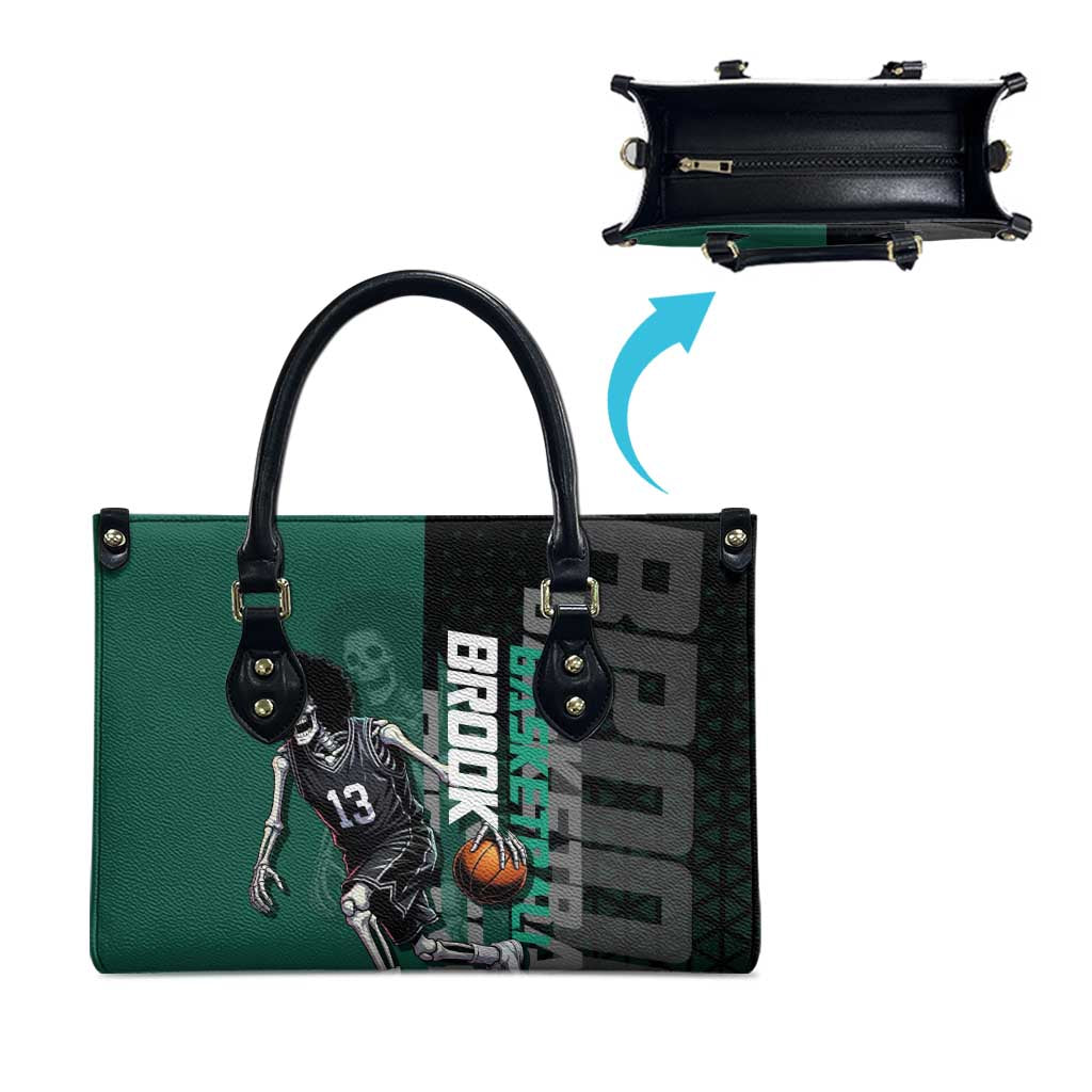 Brook One Piece Basketball Theme Green and Black Design Leather Bag with Skull Emblem and Energetic Pose - The Mazicc