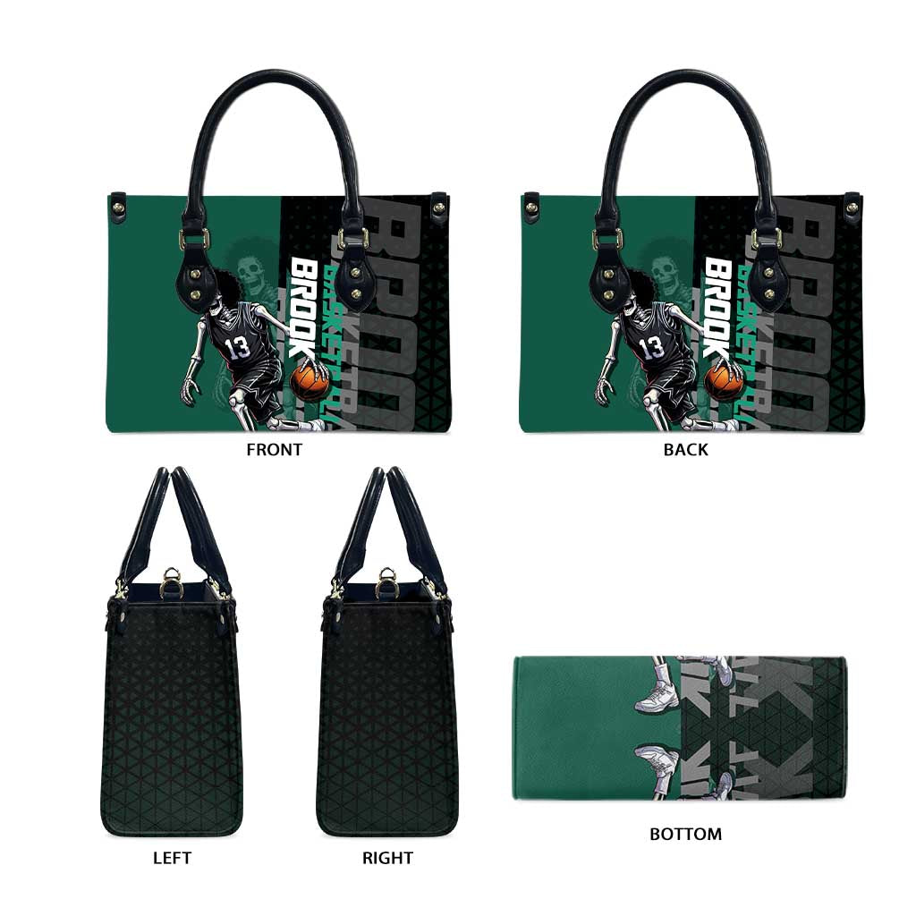 Brook One Piece Basketball Theme Green and Black Design Leather Bag with Skull Emblem and Energetic Pose - The Mazicc
