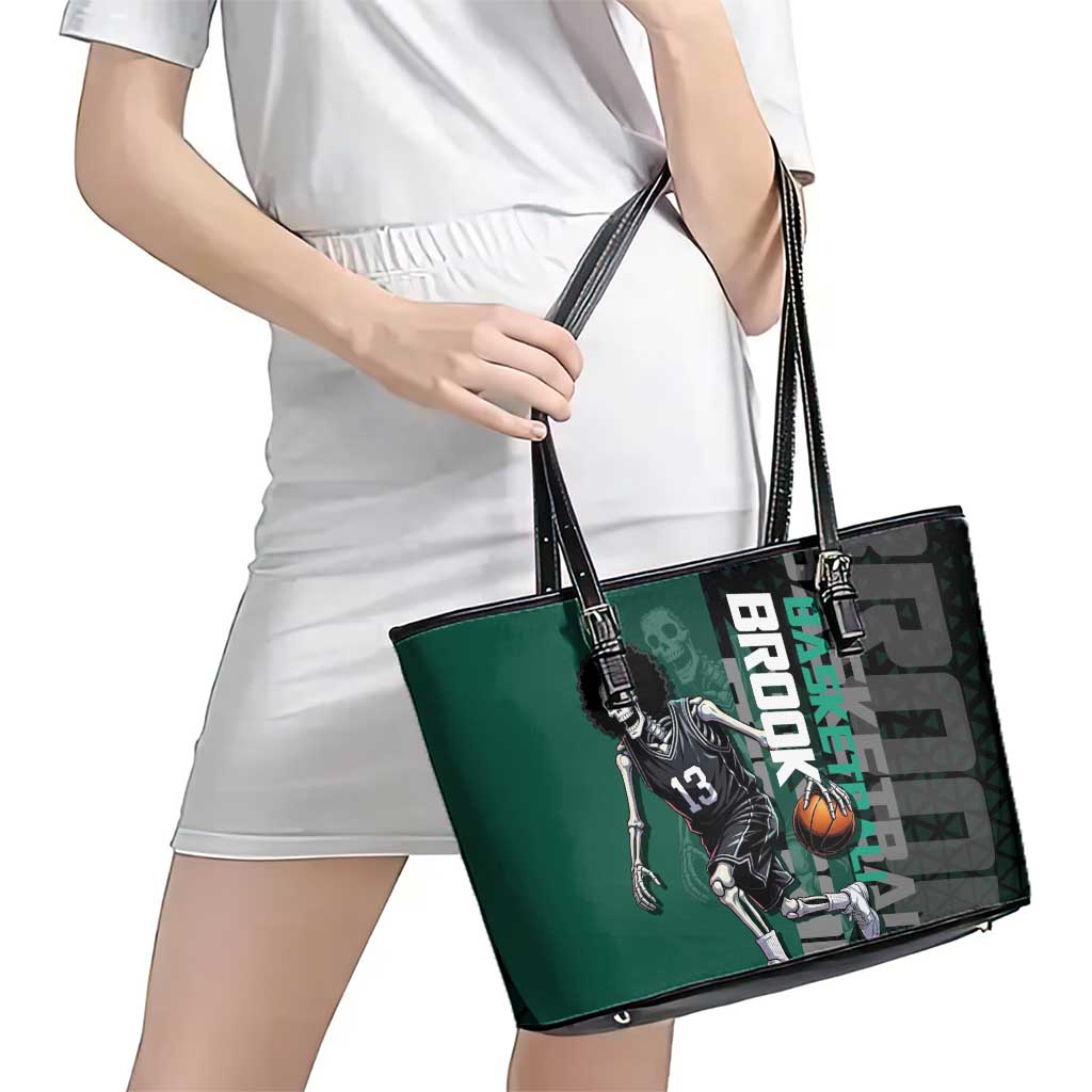Brook One Piece Basketball Theme Green and Black Design Leather Tote Bag with Skull Emblem and Energetic Pose - The Mazicc