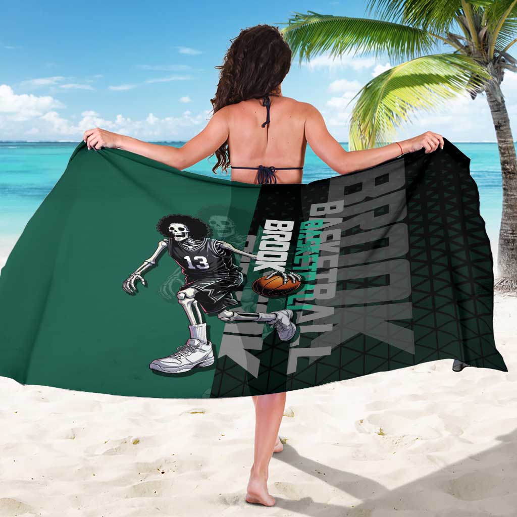 Brook One Piece Basketball Theme Green and Black Design Sarong with Skull Emblem and Energetic Pose - The Mazicc