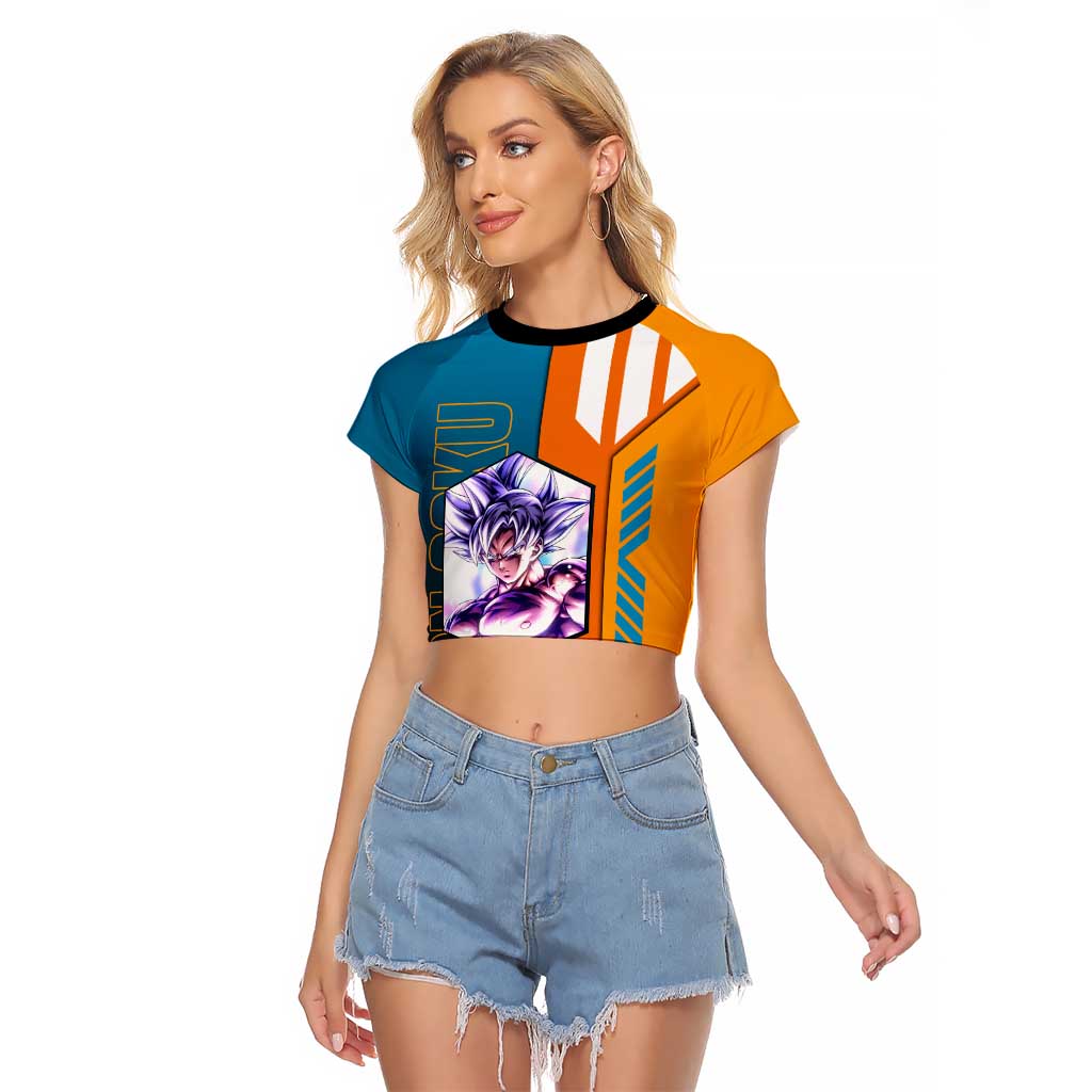 Son Goku from Dragon Ball Raglan Cropped T Shirt with Orange Gi, Power Pose, and Energy Effect Design - The Mazicc