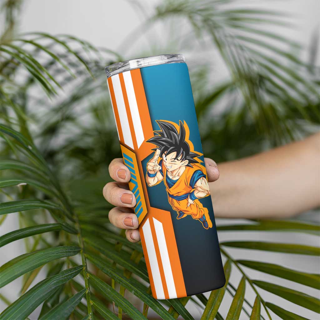 Son Goku from Dragon Ball Skinny Tumbler with Orange Gi, Power Pose, and Energy Effect Design - The Mazicc