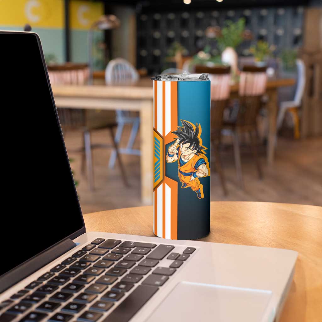 Son Goku from Dragon Ball Skinny Tumbler with Orange Gi, Power Pose, and Energy Effect Design - The Mazicc