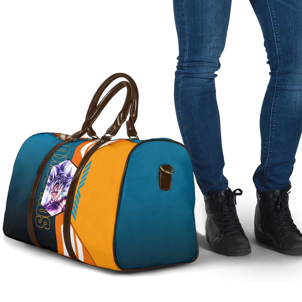 Son Goku from Dragon Ball Travel Bag with Orange Gi, Power Pose, and Energy Effect Design - The Mazicc