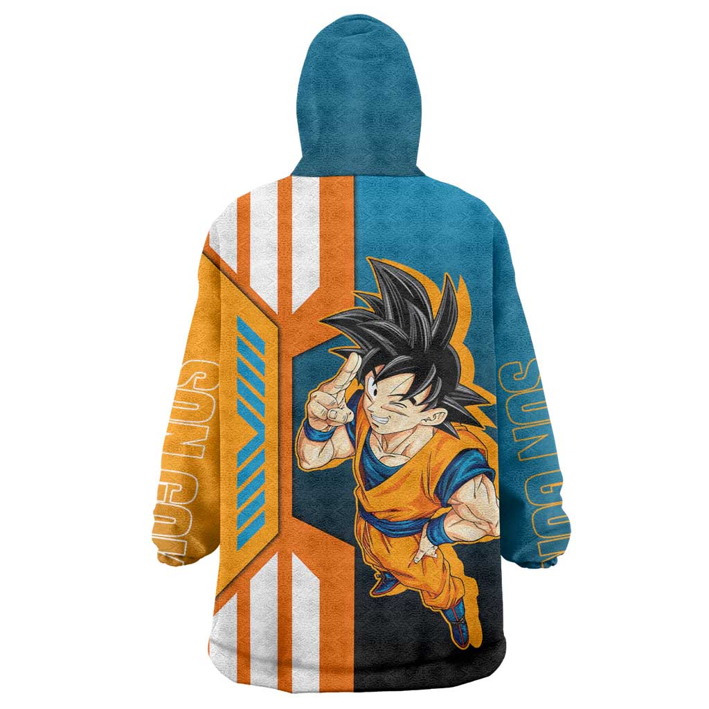 Son Goku from Dragon Ball Wearable Blanket Hoodie with Orange Gi, Power Pose, and Energy Effect Design - The Mazicc